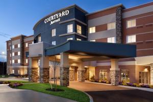 a rendering of the front of the hotel at Courtyard by Marriott Boston Dedham/Westwood in Westwood