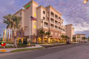 a rendering of a hotel on a street at Courtyard by Marriott St. Petersburg Clearwater/Madeira Beach in St Pete Beach