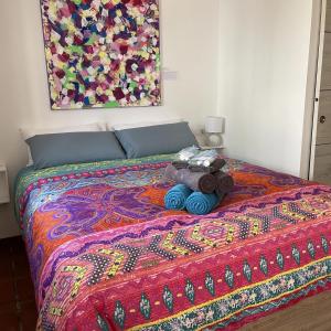 A bed or beds in a room at Terra Aloé