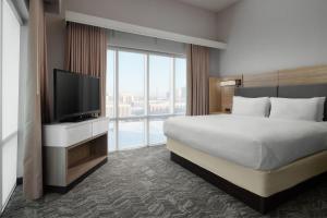 Postel nebo postele na pokoji v ubytování SpringHill Suites Minneapolis-St. Paul Airport/Mall Of America