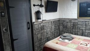 Letto o letti in una camera di Casa Jazz