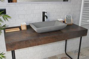 a sink on a counter in a bathroom at SUITE DEL CASTILLO in Andújar