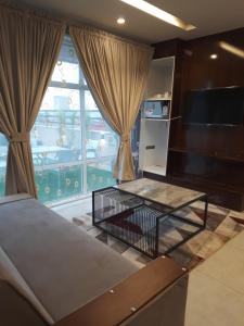 Η κουζίνα ή μικρή κουζίνα στο Pine Apartments Penthouse Bahria ISL