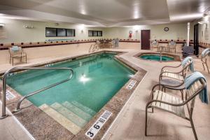 a pool in a hotel room with two swimming pools at SpringHill Suites by Marriott Salt Lake City Downtown in Salt Lake City