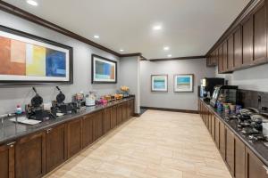 a large room with a kitchen with a counter at TownePlace Suites by Marriott Abilene Northeast in Abilene