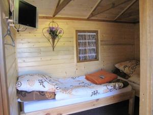 Katil atau katil-katil dalam bilik di Gościniec Grek Zorba - pokoje i domki 4 osobowe - 16km od Zator Energylandia