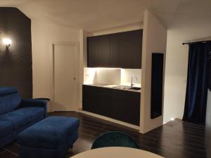 Χώρος καθιστικού στο Badolato Gallery - Luxury Rooms