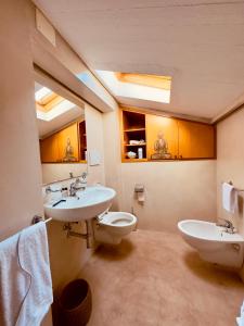 Koupelna v ubytování Hotel Baia di Talamone