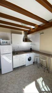 Kuchyňa alebo kuchynka v ubytovaní APARTAMENTOS HÉRCULES SEVILLa