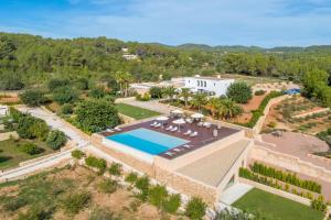 an aerial view of a villa with a swimming pool at Agroturismo Safragell Ibiza Suites & Spa in Sant Llorenç de Balafia
