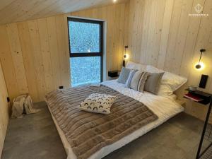 Кровать или кровати в номере Widokownia Brenna