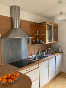 Kuchyňa alebo kuchynka v ubytovaní Chalet Mimosas