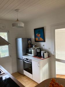 Kuchyňa alebo kuchynka v ubytovaní Chalet Mimosas