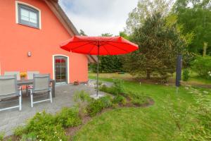 Jardín al aire libre en Stubbenfelde, Reetdachhaus Seeblick