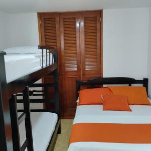 Ліжко або ліжка в номері CyM Arriendos 904