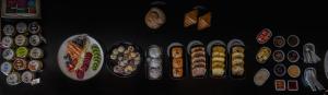 a bunch of different kinds of food in plates at Salinas Grandes Jujuy - Pristine Luxury Camp in Salinas Grandes +56 photos