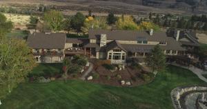 an aerial view of a large house at Casia Lodge and Ranch in Twisp