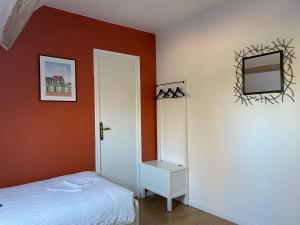 Postel nebo postele na pokoji v ubytování Le Vrai Paradis