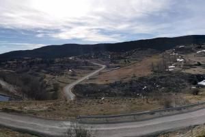 a winding road on the side of a mountain at ENJOY VALDELINARES in Valdelinares