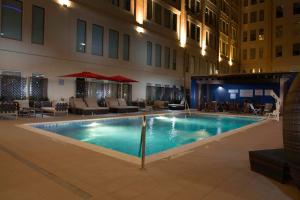 a large swimming pool in the middle of a building at Fairfield Inn & Suites by Marriott Dallas Downtown in Dallas