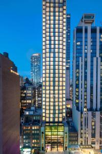 a view of a tall building in a city at Moxy NYC Chelsea in New York