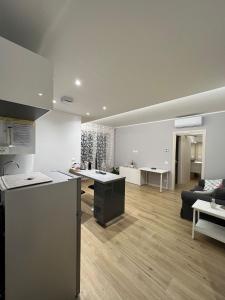 Kuchyň nebo kuchyňský kout v ubytování Appartamento con due camere da letto e free park