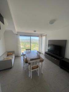 Μια τηλεόραση ή/και κέντρο ψυχαγωγίας στο Duplex en plena montaña