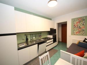 A kitchen or kitchenette at Apartment Solmare-15 by Interhome