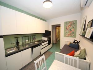 A kitchen or kitchenette at Apartment Solmare-15 by Interhome