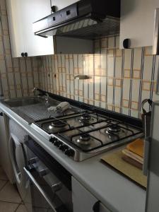 A kitchen or kitchenette at Vacanze a Finale Ligure