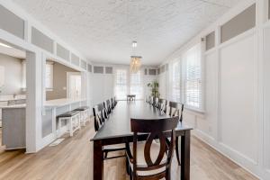 a dining room with a table and chairs at Town of Rehoboth Beach 4 Maryland Ave in Rehoboth Beach