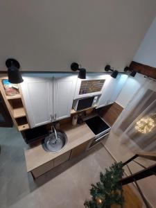 TV a/nebo společenská místnost v ubytování Stašina vikendica Divčibare