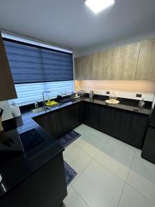 A cozinha ou kitchenette de Confortable Departamento VLC