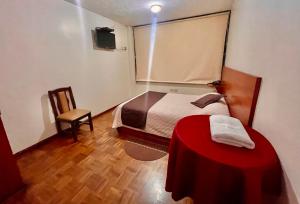 Postel nebo postele na pokoji v ubytování Hotel Bacastell