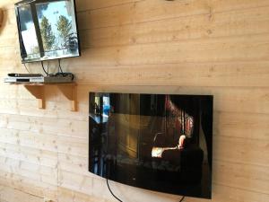 Televízia a/alebo spoločenská miestnosť v ubytovaní Studio cosy au pied des pistes avec cheminée et douche balnéo - Villard-de-Lans - FR-1-515-154