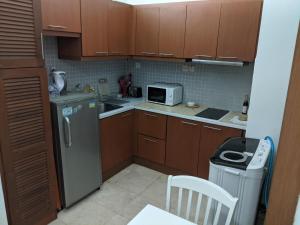Damansara Semantan Suites tesisinde mutfak veya mini mutfak