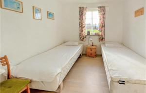 Ένα ή περισσότερα κρεβάτια σε δωμάτιο στο Stunning Home In Markaryd With Kitchen