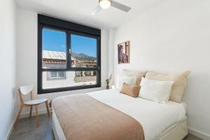 Posteľ alebo postele v izbe v ubytovaní Jabega Beach Apartment in Malaga by Solaga Holiday Homes