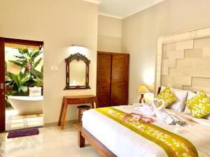 Three Brothers Bungalows & Villas客房内的一张或多张床位