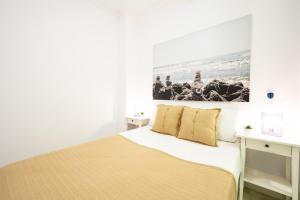Postel nebo postele na pokoji v ubytování 2 minutes to the sea -Cano 2 bedroom by 10ToSea