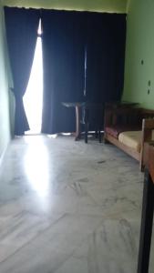 Postel nebo postele na pokoji v ubytování Homestay Budget Bukit Beruntung