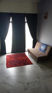 Posezení v ubytování Homestay Budget Bukit Beruntung + 11 fotografií