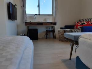 TV a/nebo společenská místnost v ubytování Green Grass B&B