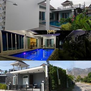 une maison avec une piscine devant dans l'établissement Aranya pool villa, à Ban Phu Yai