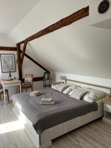 Posteľ alebo postele v izbe v ubytovaní Apartmány Lavander Mikulov
