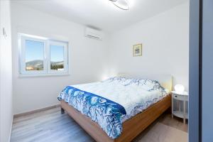 Posteľ alebo postele v izbe v ubytovaní Ferienhaus Relax - beheizter - heated Pool + 28 fotografií