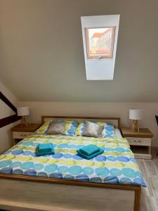 Posteľ alebo postele v izbe v ubytovaní Apartmány Lavander Mikulov