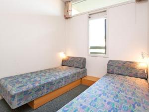 Postel nebo postele na pokoji v ubytování Apartment Fanø VII