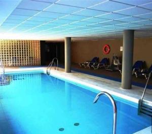 Bazén v ubytovaní Atico Duplex en Playa Serena alebo v jeho blízkosti