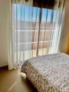 Posteľ alebo postele v izbe v ubytovaní Atico Duplex en Playa Serena